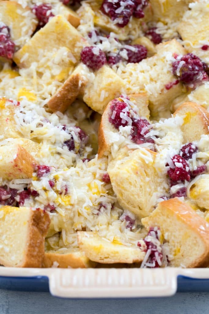 A closeup of the raspberry coconut french toast casserole before baking