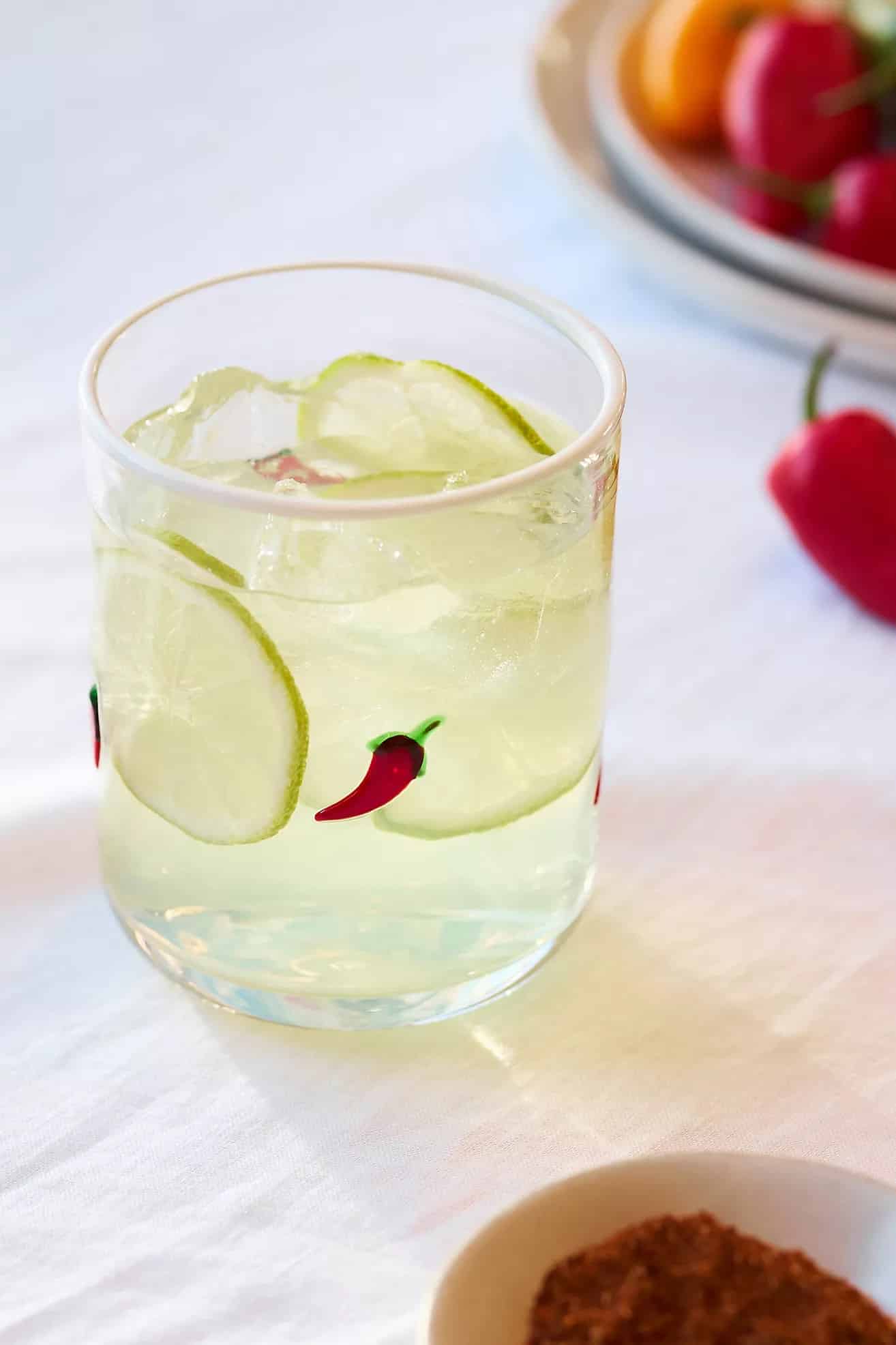 Little juice glasses with jalapeños.
