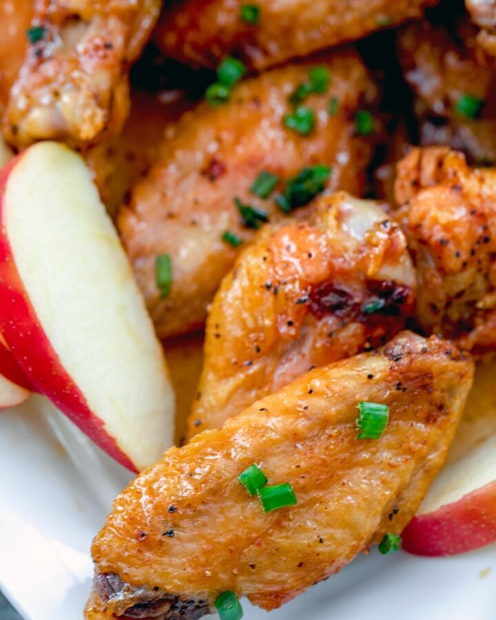 Apple Cider Chicken Wings -- These simple baked chicken wings are tossed in an apple cider sauce and make for the coziest fall dinner | wearenotmartha.com #chickenwings #applecider #easydinner #chickenrecipes