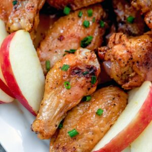 These simple baked chicken wings are tossed in an apple cider sauce and make for the coziest fall dinner.
