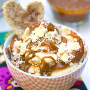 Apple Pie Ice Cream -- This Apple Pie Ice Cream has all the elements of your favorite seasonal treat: apple pie filling, apple cider caramel, and pie crust cookies. It will convince you to keep your ice cream machine out all fall and winter long | wearenotmartha.com