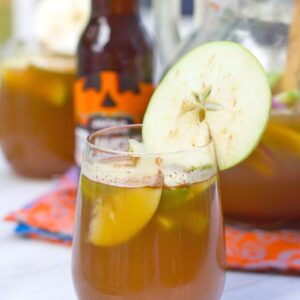 Apple Pumpkin Shandy Sangria -- Apple Pumpkin Shandy Sangria combines apple cider, pumpkin shandy beer, and apple brandy for a deliciously fall flavored apple sangria cocktail | wearenotmartha.com