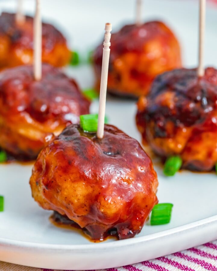BBQ Chicken Meatballs -- These BBQ Chicken Meatballs are one of my favorite easy party appetizers, but they also make a delicious dinner when served with a couple veggie sides! | wearenotmartha.com