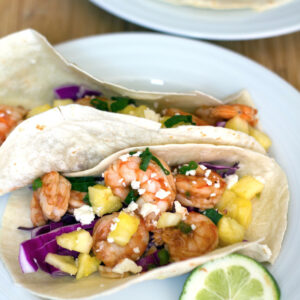 BBQ Shrimp Tacos -- From the shrimp to the BBQ sauce to the pineapple, these BBQ Shrimp Tacos are the stuff summer dreams are made of! | wearenotmartha.com