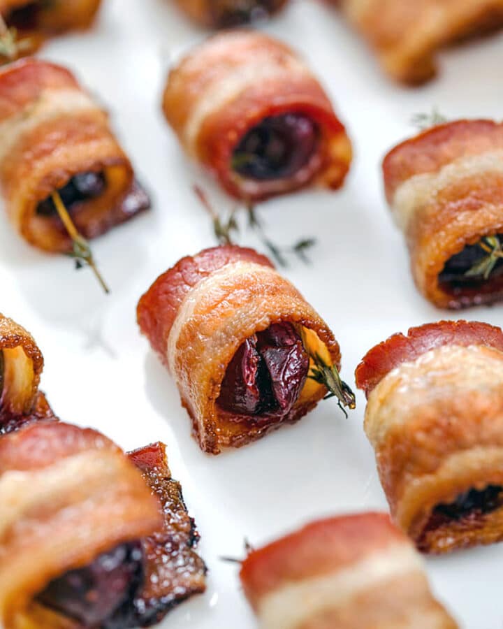 Bacon Wrapped Cherries with Thyme -- Your search for the perfect easy summer appetizer is over! These Bacon Wrapped Cherries with Thyme involve just three ingredients and are incredibly unique bite-sized party apps | wearenotmartha.com