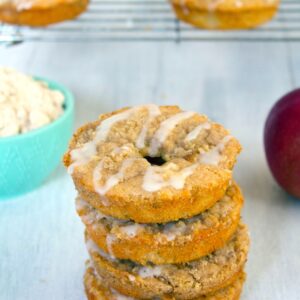 Baked Apple Coffee Cake Doughnuts -- The only thing better than apple cider doughnuts are baked apple coffee cake doughnuts- doughnuts with apple streusel, fresh apples, apple cider, and buttermilk | wearenotmartha.com