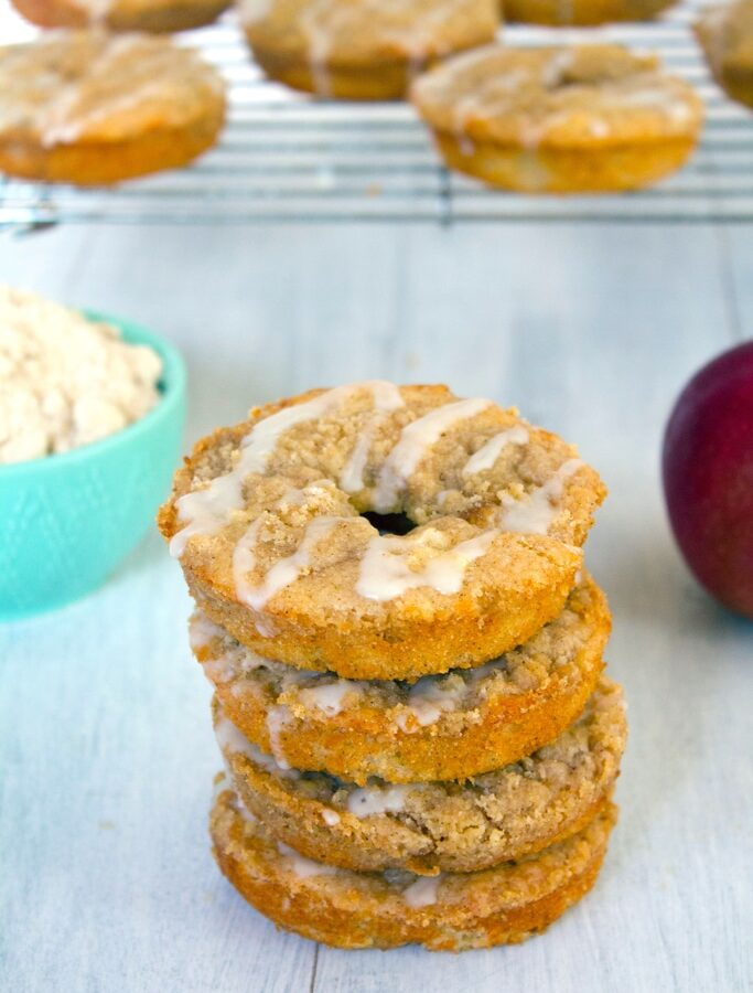 Baked Apple Coffee Cake Doughnuts -- The only thing better than apple cider doughnuts are baked apple coffee cake doughnuts- doughnuts with apple streusel, fresh apples, apple cider, and buttermilk | wearenotmartha.com