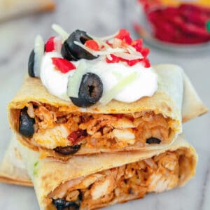 Baked Chicken Chimichangas -- Looking for an quick weeknight meal that's delicious and healthy? These Baked Chicken Chimichangas are easy to make and healthier than most Mexican food. Plus, they make a great freezer meal! | wearenotmartha.com