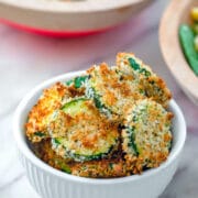 Baked Zucchini Chips -- What to do with all that summer zucchini? These Baked Zucchini Chips are deliciously flavorful and healthy and have the most satisfying crunch. Enjoy them as a side dish, snack, or salad topper! | wearenotmartha.com