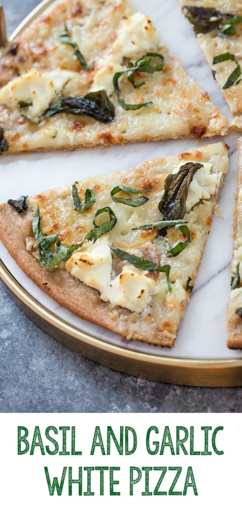 Basil and Garlic White Pizza -- Traditional pizza is always delicious, but there's something about a cheese-filled white pizza that really hits the spot. Add on a slathering of garlic oil and plenty of basil and you'll be in pizza heaven | wearenotmartha.com