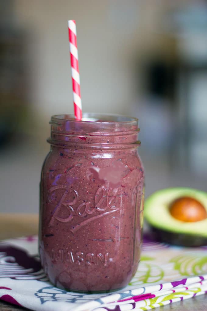 Beet Avocado Smoothie -- Have you ever had a beet smoothie? Don't be scared! This smoothie is packed with sweet flavor from beets, avocado, berries, and spinach and is a healthy addition to your diet | wearenotmartha.com