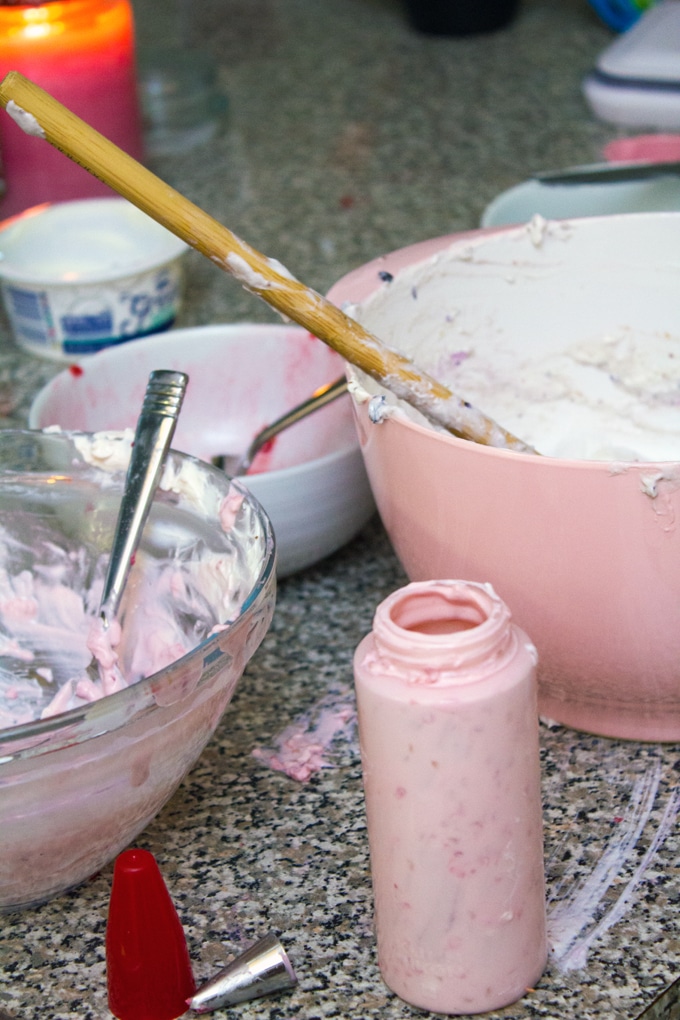 Image showing messy kitchen with Greek cream cheese and fruit bowls and yogurt smeared on counter