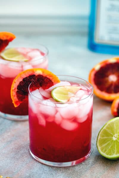 Blood Orange Gin Lime Rickey -- Searching for a delicious cocktail that's sure to brighten up your winter? I took a classic lime rickey drink and added fresh blood orange juice and gin for these blood orange gin cocktails! | wearenotmartha.com #gin #cocktails #gindrinks #bloodoranges #cocktails