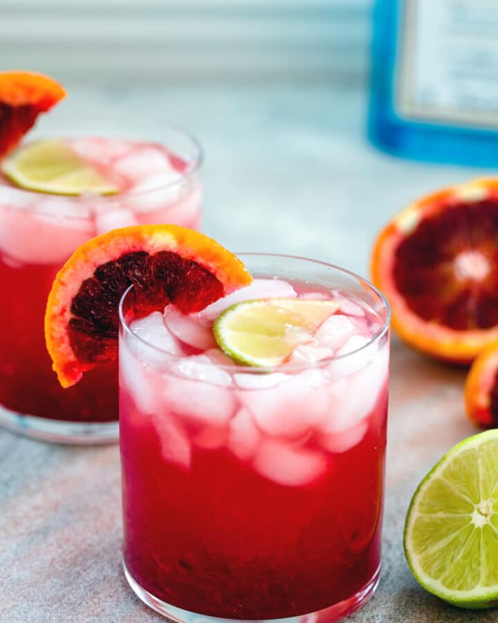 Blood Orange Gin Lime Rickey -- Searching for a delicious cocktail that's sure to brighten up your winter? I took a classic lime rickey drink and added fresh blood orange juice and gin for these blood orange gin cocktails! | wearenotmartha.com #gin #cocktails #gindrinks #bloodoranges #cocktails