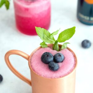 Blueberry Frozen Moscow Mules -- Ginger beer, vodka, and blueberry simple syrup are blended with crushed ice for this summertime frozen cocktail | wearenotmartha.com