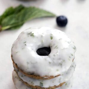 Blueberry Mojito Doughnuts -- These blueberry doughnuts take the classic flavors of a mojito and turn them into a cocktail-themed treat that's perfectly acceptable to enjoy with your morning coffee | wearenotmartha.com