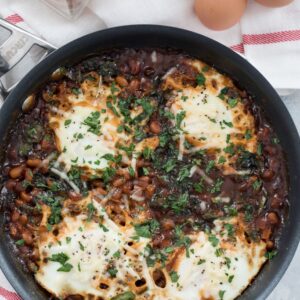 Boston Baked Beans and Eggs -- This skillet breakfast or dinner takes comfort food to new levels | wearenotmartha.com