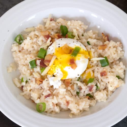 Breakfast Risotto -- Start your day with risotto made with bacon and cheddar cheese with a poached egg on top | wearenotmartha.com