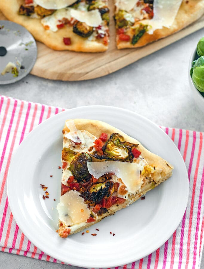 Brussels Sprouts and Pancetta Flatbread -- The key to getting anyone to love brussels sprouts? Add them to pizza! This Brussels Sprouts and Pancetta Flatbread is sure to win everyone over | wearenotmartha.com