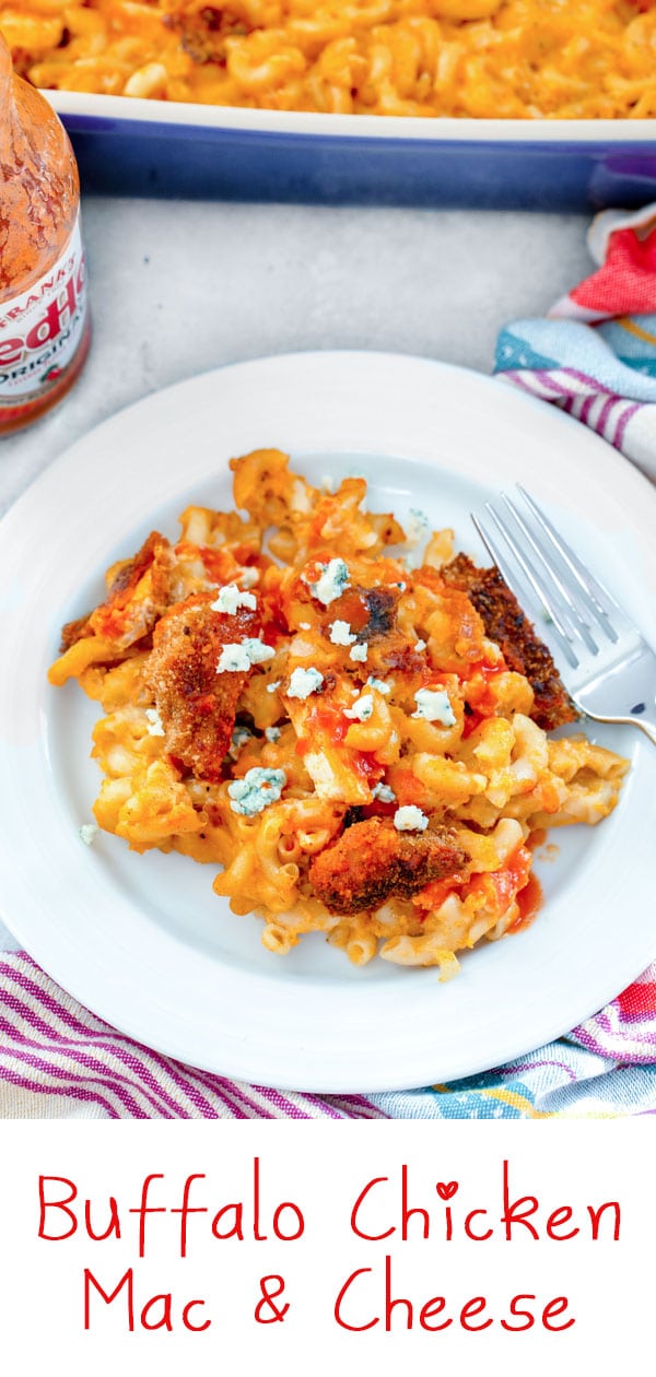 Buffalo Chicken Mac and Cheese -- This Buffalo Chicken Mac and Cheese is deliciously spicy, ridiculously cheesy, and basically the best comfort food ever. It makes for a wonderful dinner (with a salad on the side!) and is also perfect for serving in appetizer-sized portions at parties | wearenotmartha.com #macandcheese #macaroniandcheese #buffalochicken #chicken #dinners