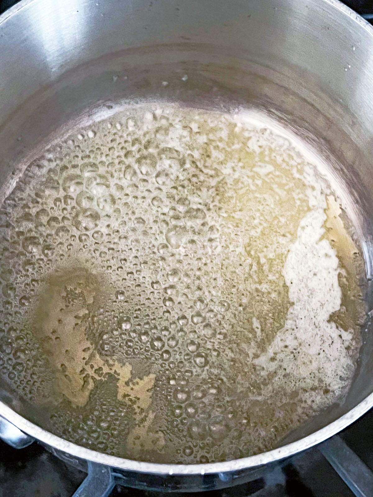 Butter melted in saucepan.