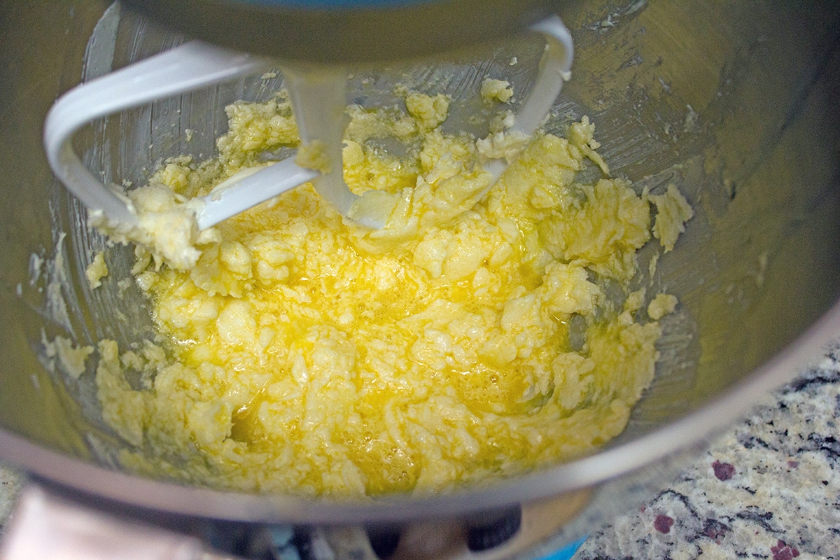 Butter, sugar, and egg in mixing bowl.