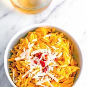 This Butternut Squash Orzo it packed with creamy butternut squash sauce, crumbled bacon, and parmesan cheese. It's incredibly easy to make and can be served as either an entree or a side!