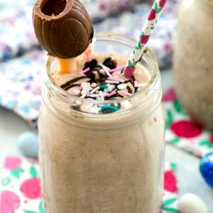 Cadbury Egg Milkshake -- The ultimate Easter milkshake, this Cadbury Egg Milkshake combines ice cream with Cadbury Mini Eggs, caramel, and chocolate sauce and is topped with a Cadbury Creme Egg garnish | wearenotmartha.com