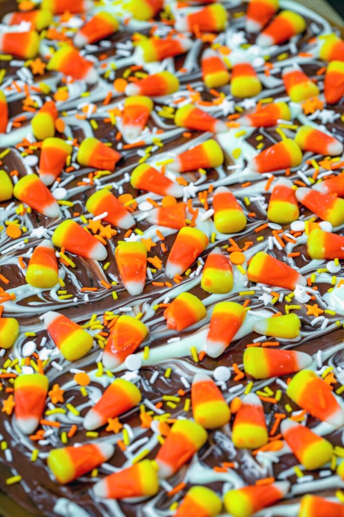 Toffee with candy corn and sprinkles scattered around