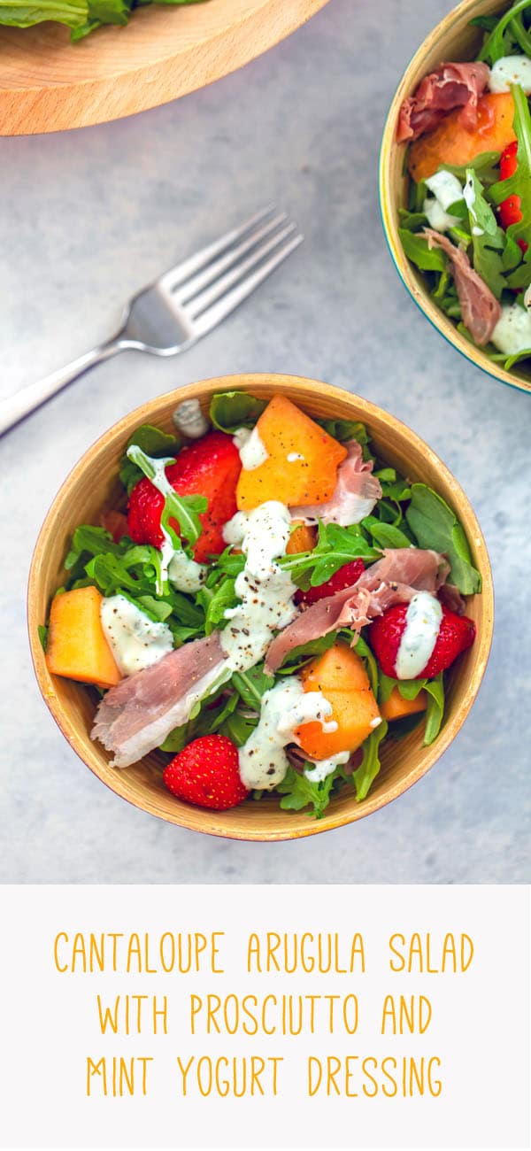 Cantaloupe and Prosciutto Arugula Salad with Mint Yogurt Dressing -- This easy to prepare Cantaloupe and Prosciutto Salad is packed with fresh ingredients, including strawberries, arugula, and goat cheese and is topped with a delicious mint yogurt dressing | wearenotmartha.com #salad #cantaloupe #prosciutto