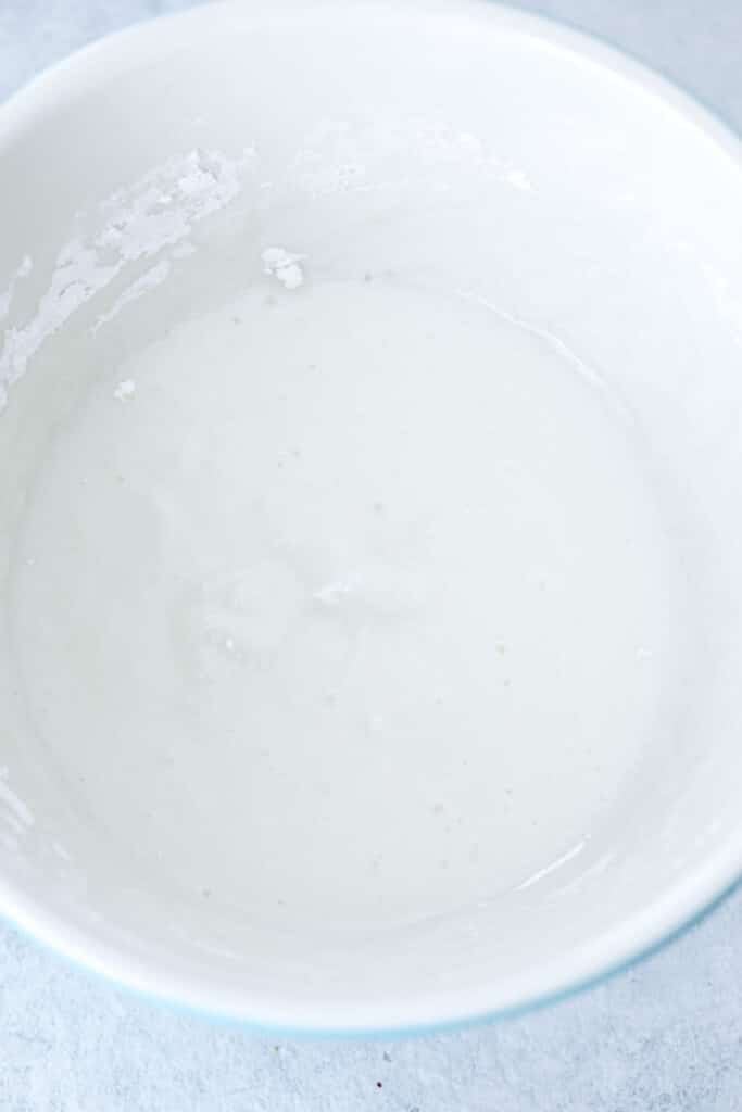 Overhead view of Greek yogurt icing in bowl