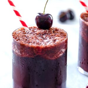 Cherry Coke and Rum -- Is there anything better than a Cherry Coke? Yes there is! A Cherry Coke AND Rum. This summer cocktail is incredibly easy to make and utilizes fresh cherries for a homemade rum and cherry coke | wearenotmartha.com