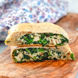 These Chicken and Spinach Calzones are incredibly easy to make, a little bit healthier than the average calzone, and packed with delicious flavor!