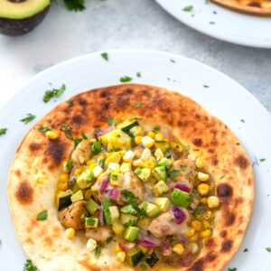 Chicken and Summer Vegetable Tostadas -- These chicken and vegetable tostadas are incredibly easy to make and packed with summer vegetables. And did I mention they go perfectly with a cold glass of white wine? | wearenotmartha.com