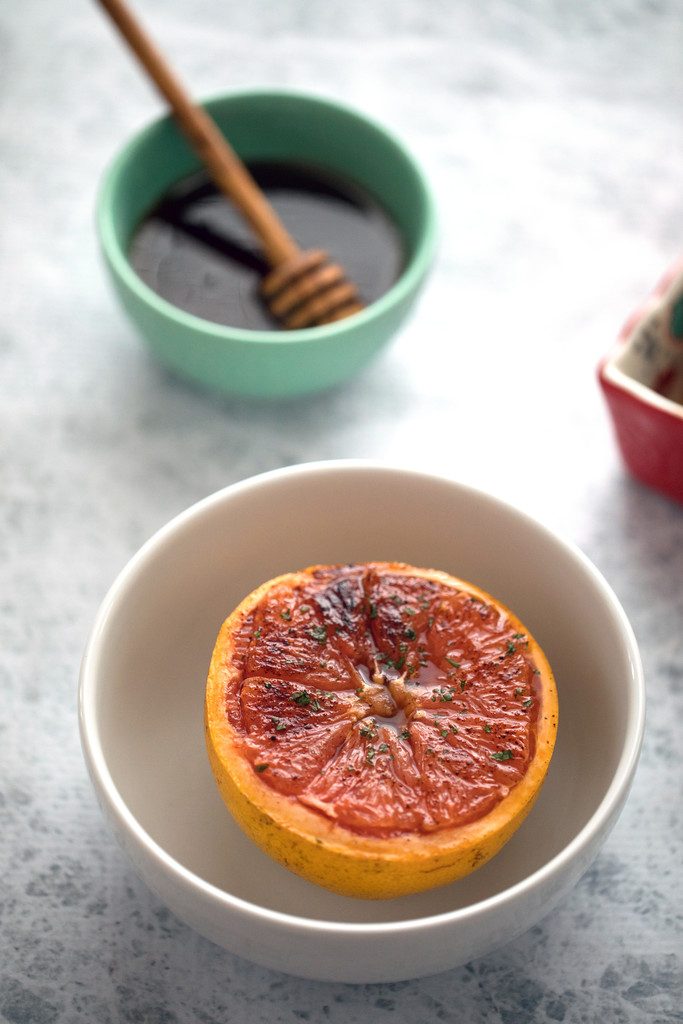 Chili Honey Roasted Grapefruit -- Grapefruit makes the perfect breakfast, dessert, or anytime snack... Especially when it's sprinkled with chili pepper for a kick, and drizzled with honey for some sweetness | wearenotmartha.com