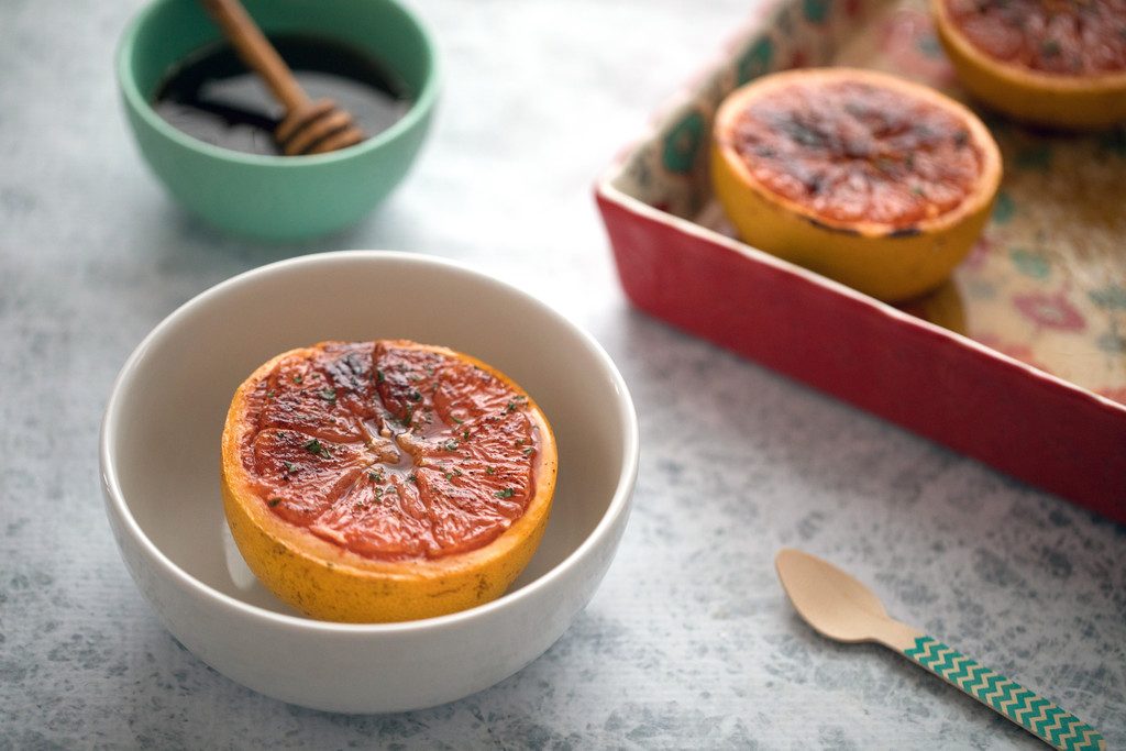 Chili Honey Roasted Grapefruit -- Grapefruit makes the perfect breakfast, dessert, or anytime snack... Especially when it's sprinkled with chili pepper for a kick, and drizzled with honey for some sweetness | wearenotmartha.com