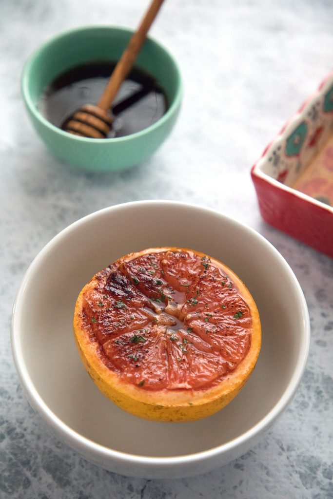 Chili Honey Roasted Grapefruit -- Grapefruit makes the perfect breakfast, dessert, or anytime snack... Especially when it's sprinkled with chili pepper for a kick, and drizzled with honey for some sweetness | wearenotmartha.com