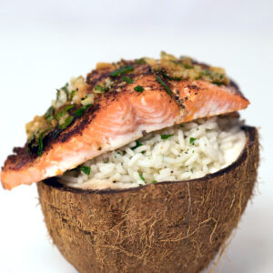 Chili Lime Salmon Over Coconut Rice -- This easy weeknight dinner is served in a fresh coconut! | wearenotmartha.com