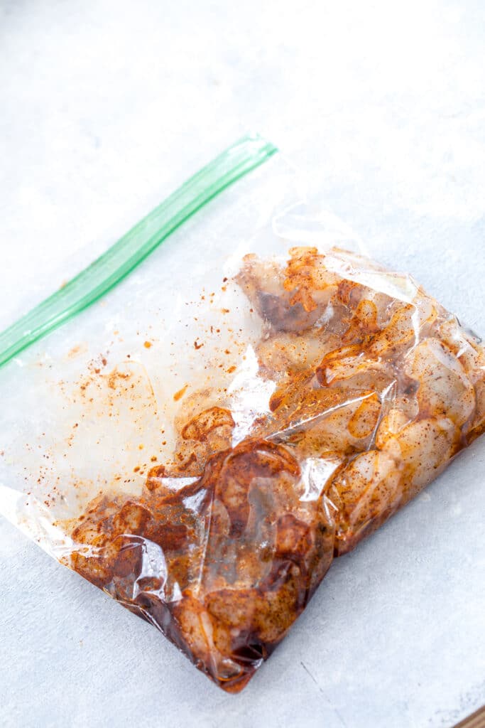 Shrimp in large Ziplock bag with marinade.