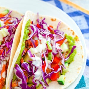 Chipotle-Rubbed Grilled Salmon Tacos -- An easy weeknight dinner that's also fit for company? These Chipotle-Rubbed Grilled Salmon Tacos are delicious for any occasion. Plus, the apple cucumber salsa adds the perfect crunch! | wearenotmartha.com