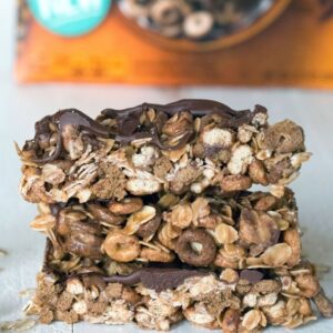 Chocolate Peanut Butter Cheerios Granola Bars: This no-bake granola bar recipe uses Chocolate Peanut Butter Cheerios; a peanut butter, honey, and coconut oil mixture; and a little extra chocolate for good measure | wearenotmartha.com