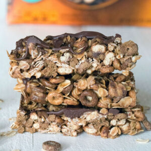 Head-on closeup view of a stack of three Chocolate Peanut Butter Cheerios granola bars