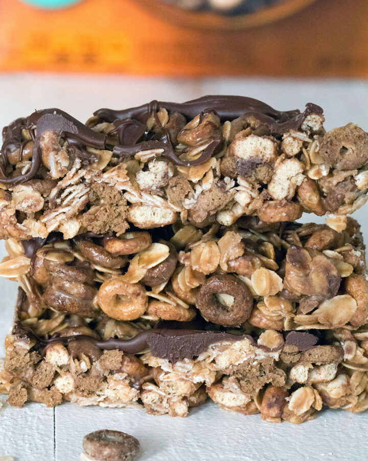 Head-on closeup view of a stack of three Chocolate Peanut Butter Cheerios granola bars