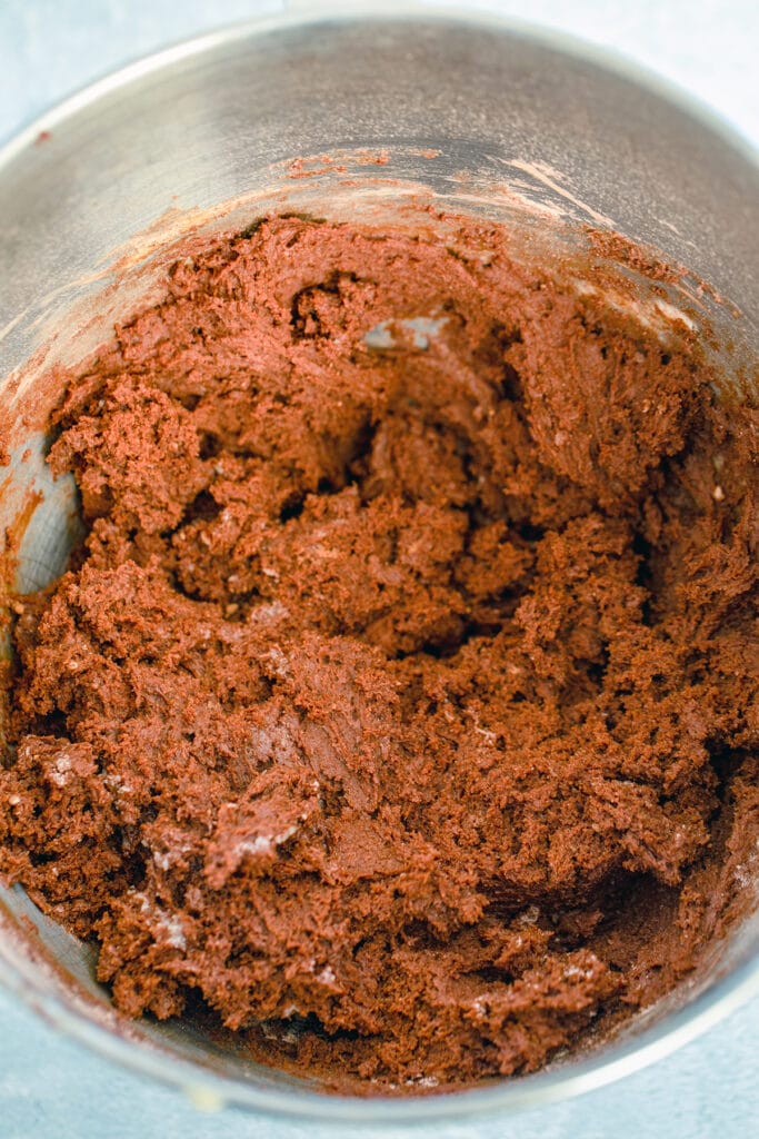 Chocolate cookie batter in mixing bowl