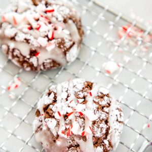 Chocolate Peppermint Sour Cream Crinkle Cookies -- Want to know the key to the best crinkle cookies? Sour cream! These Chocolate Peppermint Sour Cream Crinkle Cookies are ridiculously moist and chocolatey and are a festive addition to your holiday cookie plater | wearenotmartha.com