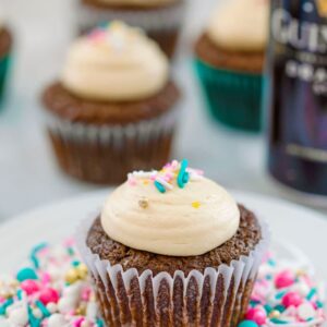 Chocolate Stout Cupcakes with Irish Whiskey Filling and Baileys Frosting -- You don't have to be Irish and it doesn't have to be St. Patrick's Day for you to fall in love with these Chocolate Stout Cupcakes with Irish Whiskey Filling and Baileys Frosting! | wearenotmartha.com