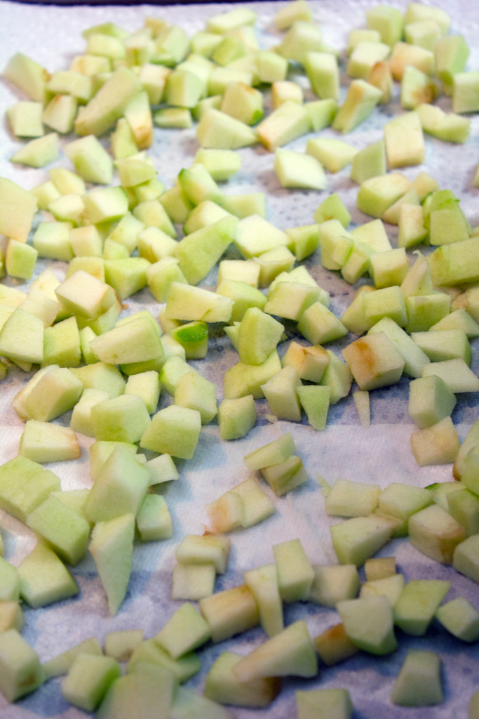 Overhead view of chopped Granny Smith Apples Drying on paper towels