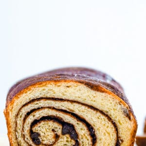 Cinnamon Raisin Bread -- This Cinnamon Raisin Bread is easy for beginner bread makers and results in slices with the perfect cinnamon swirl. Feel free to leave the raisins out for a still delicious cinnamon bread! | wearenotmartha.com