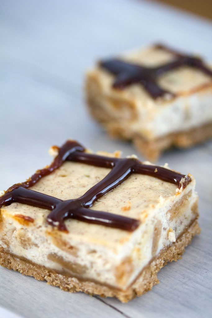 Cinnamon Bun Oreo Cheesecake Bars -- These Cheesecake Bars use Cinnamon Bun Oreo Cookies in the cookie crust and and the cheesecake filling | wearenotmartha.com