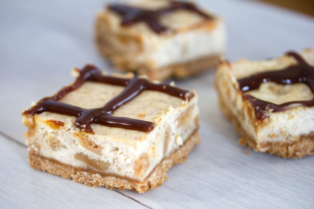 Cinnamon Bun Oreo Cheesecake Bars -- These Cheesecake Bars use Cinnamon Bun Oreo Cookies in the cookie crust and and the cheesecake filling | wearenotmartha.com